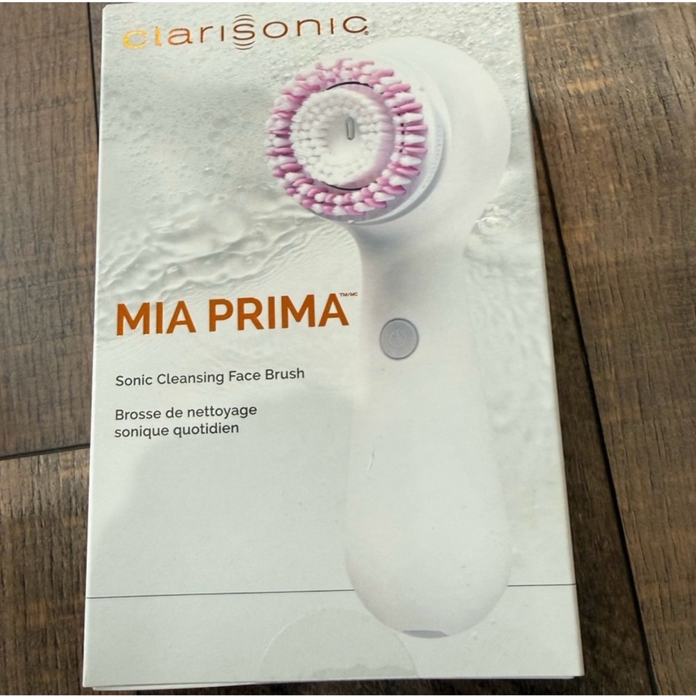 Clarisonic White and Orange Cleansing Device